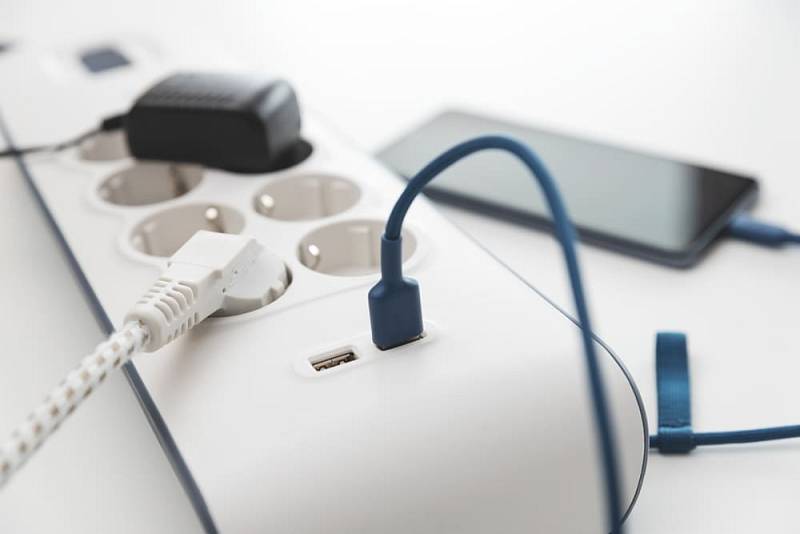 Smartphone,Charging,At,Home.,Electrical,Equipment,,Electrical,Wires,And,Power